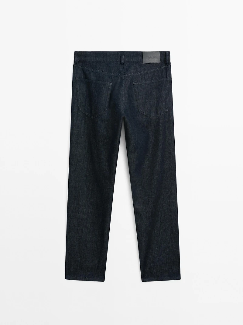 Cotton blend tapered fit jeans
