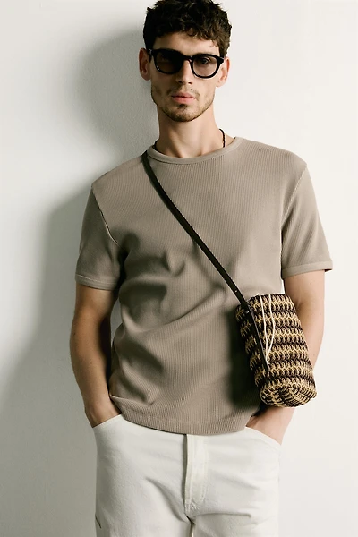 BRAIDED VERTICAL CROSSBODY BAG