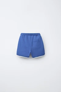 SHORT DE JOGGING À LISERÉS