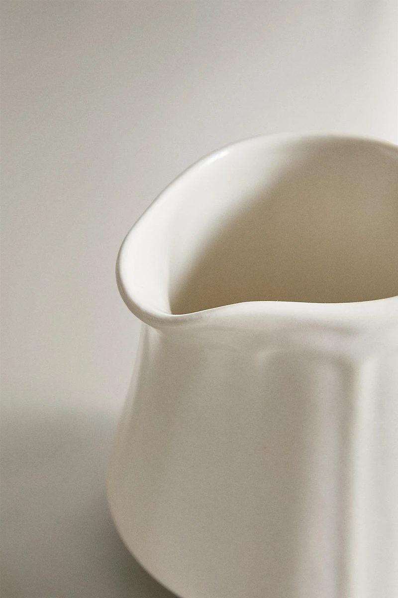 PORCELAIN CREAM PITCHER WITH RAISED PATTERN