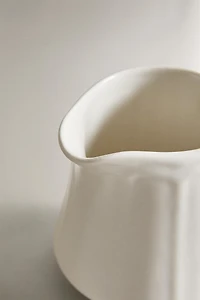 PORCELAIN CREAM PITCHER WITH RAISED PATTERN