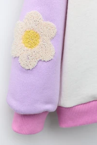 CONTRASTING SLEEVE FLORAL SWEATSHIRT