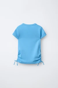 MODAL T-SHIRT WITH CUT OUTS AND BOWS