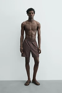 LONG CARGO SWIM TRUNKS