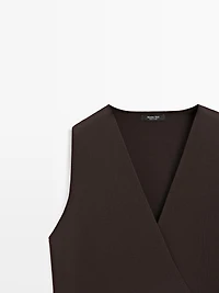 Crossover knit vest with tie detail