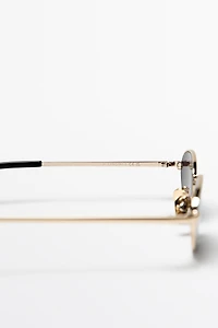 Lunettes de soleil ovales métalliques