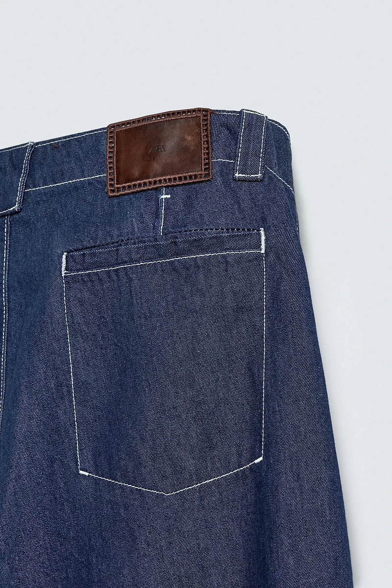 EMBROIDERED BAND DETAIL JEANS
