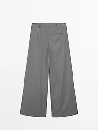 Flowing trousers with darts