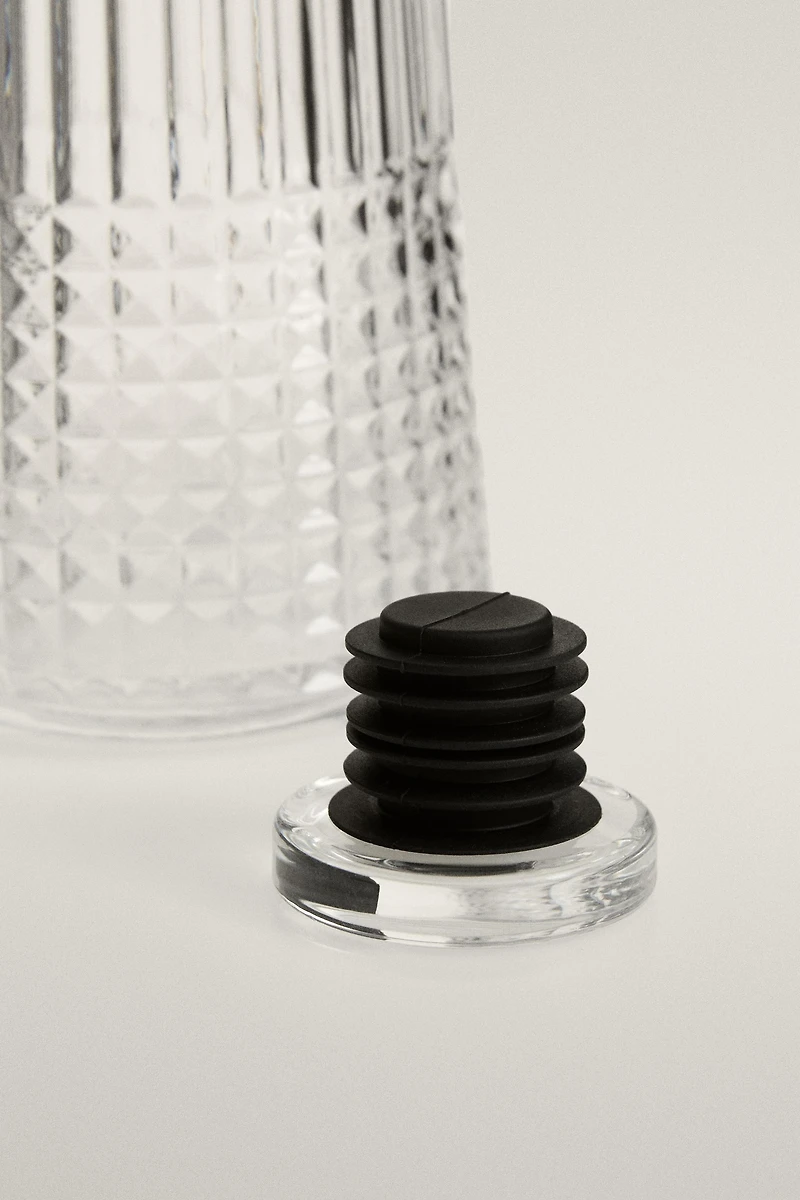 RAISED DESIGN GLASS BOTTLE