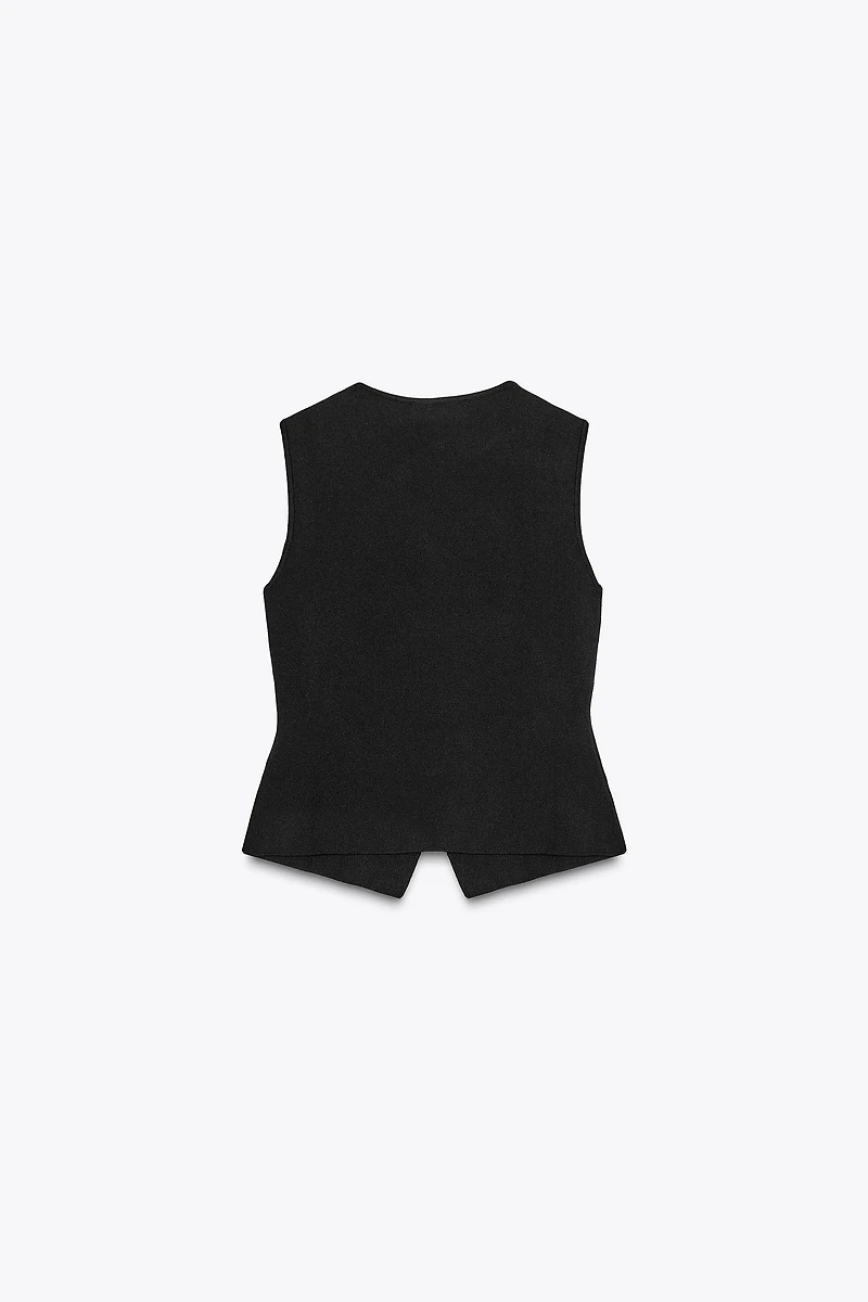 PEPLUM KNIT TOP