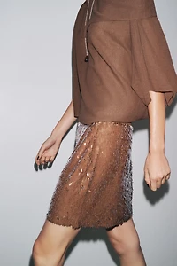 MINI JUPE À SEQUINS