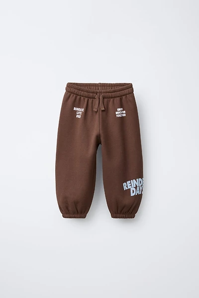 FLOCKED TEXT JOGGER PANTS