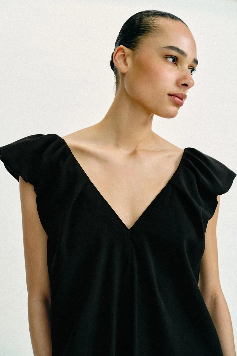 ROBE LONGUE À MANCHES BOUFFANTES