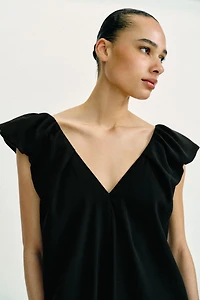 ROBE LONGUE À MANCHES BOUFFANTES