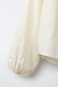 BLOUSE À CLOUS