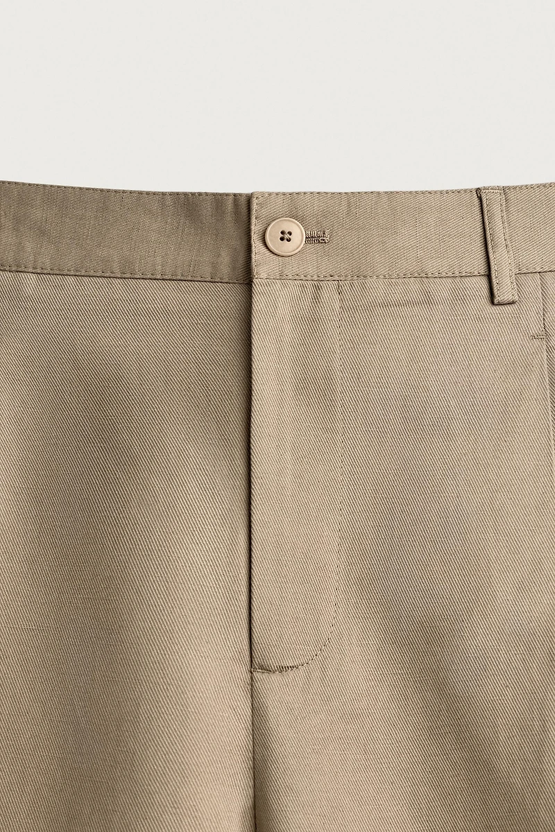 RELAXED FIT PLEATED PANTS