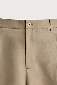 RELAXED FIT PLEATED PANTS