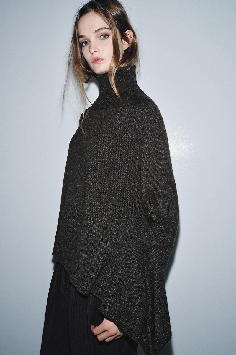 WOOL SWEATER WITH ASYMMETRIC HEM