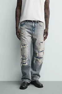 LOOSE FIT RIPPED JEANS
