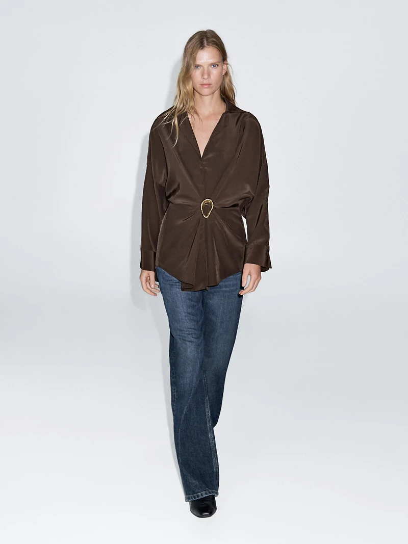 Long shirt with brooch detail