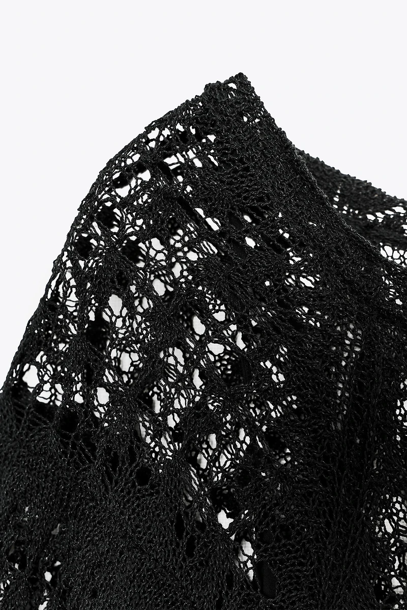 ROBE LONGUE EN MAILLE POINTELLE À VOLANT