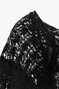 ROBE LONGUE EN MAILLE POINTELLE À VOLANT