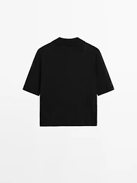 Pull en maille ajourée à col polo