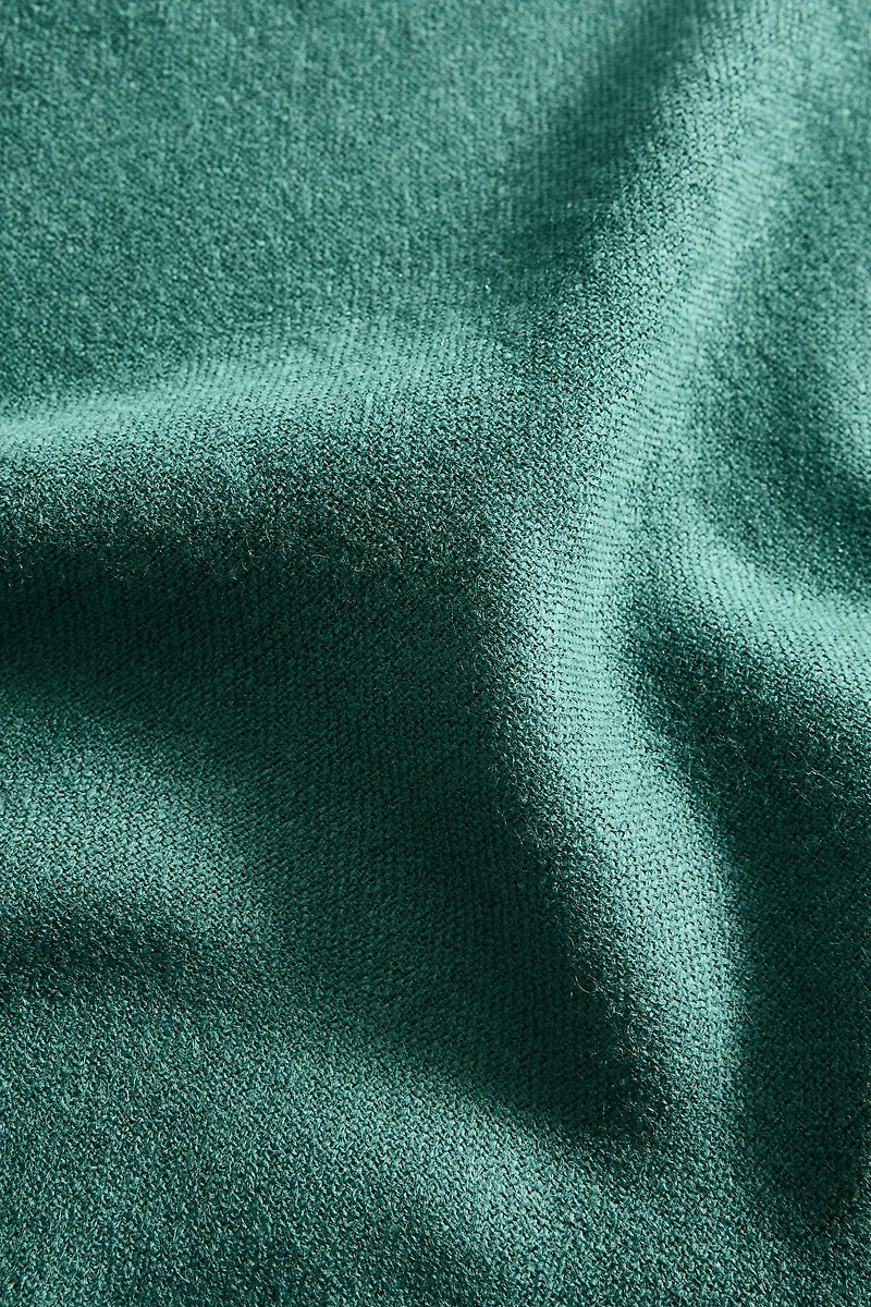 PLAID DÉCORATIF FRANGES