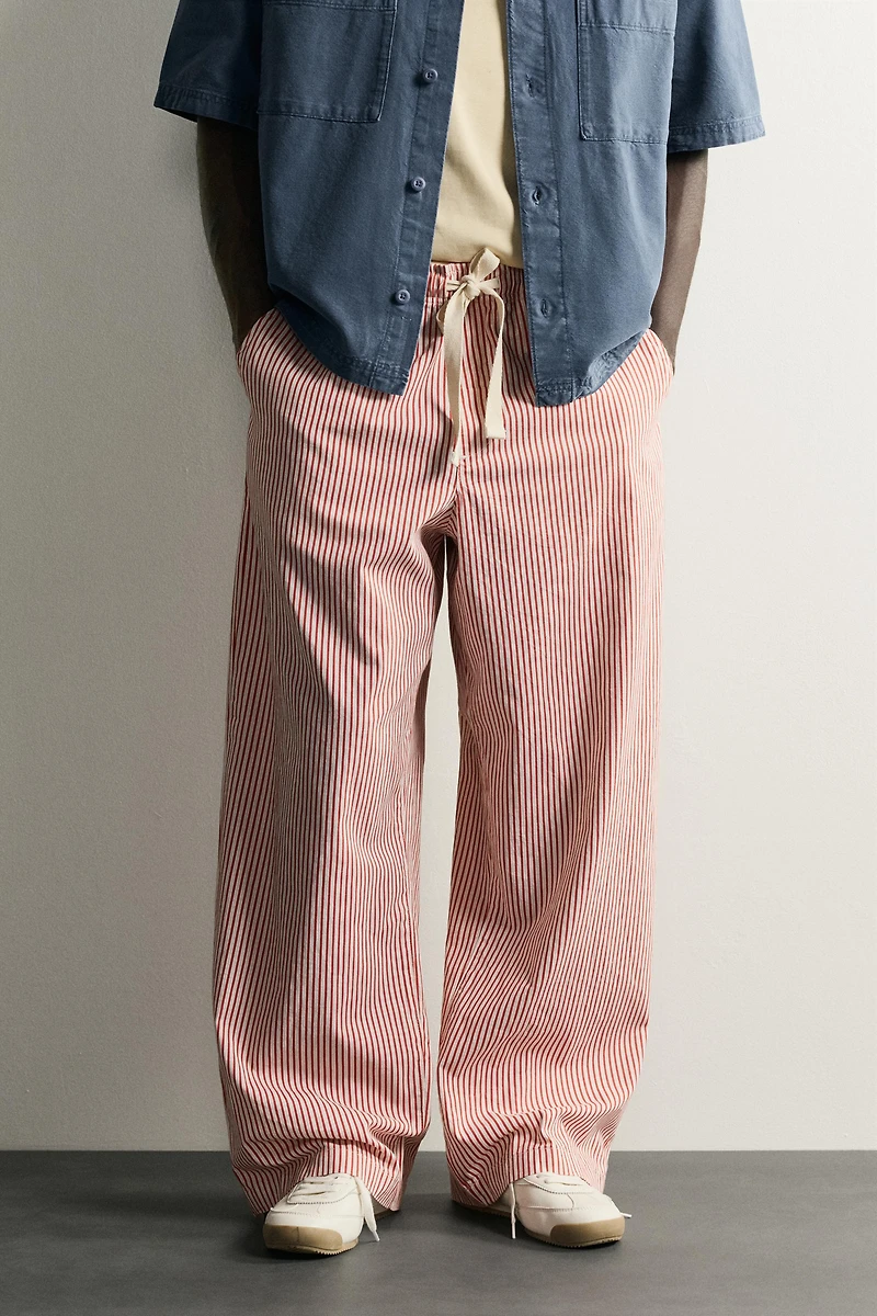 STRIPED BAGGY FIT PANTS