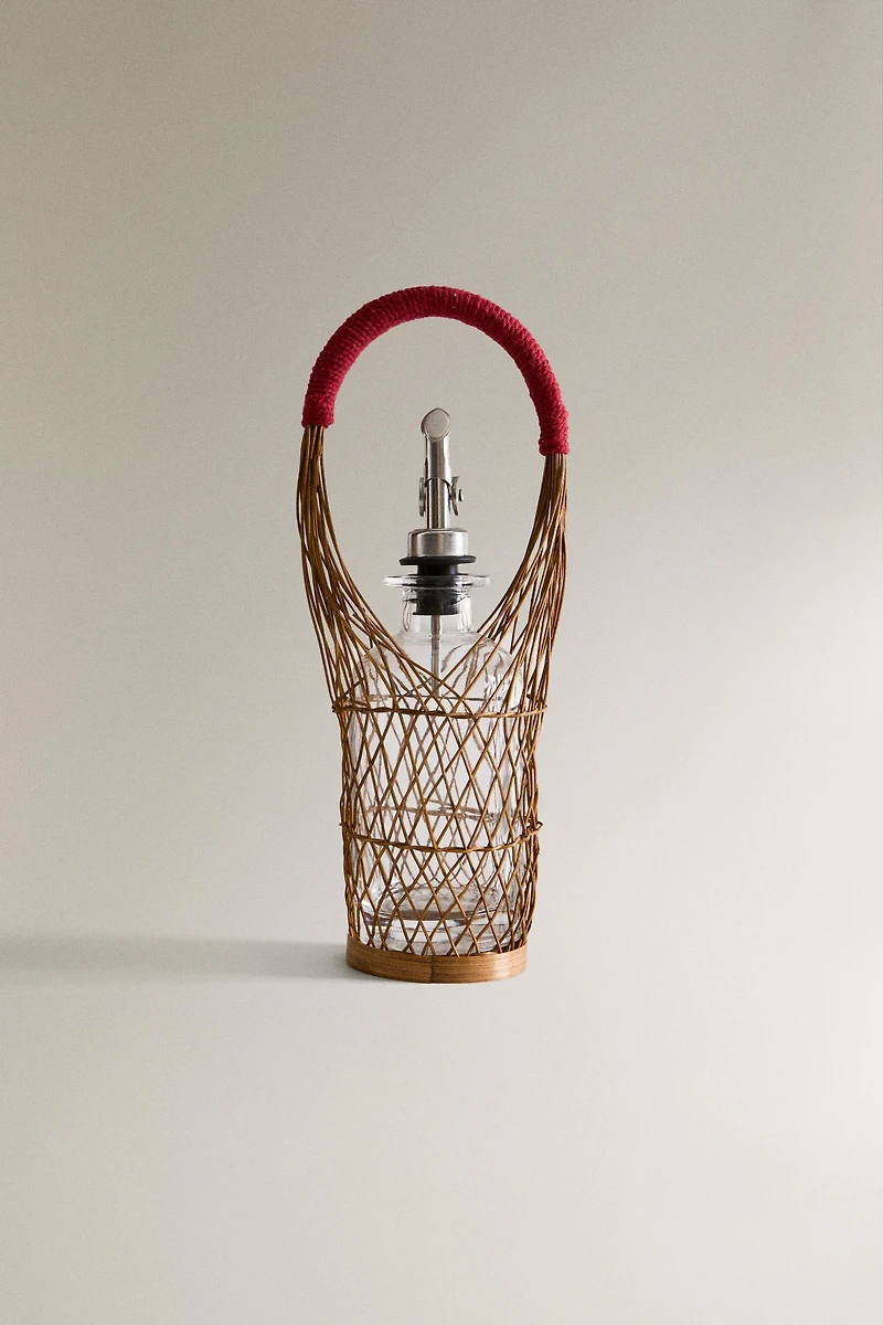GLASS CRUET WITH RATTAN BASKET