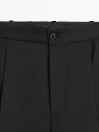 Flowing trousers with darts