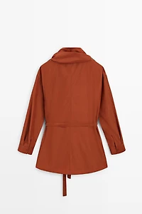 Flowing blouse with tie detail