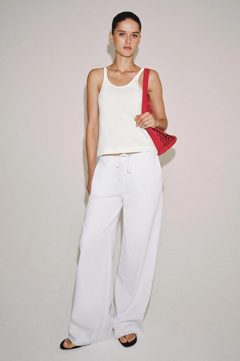 INTERLOCK STRAP TOP