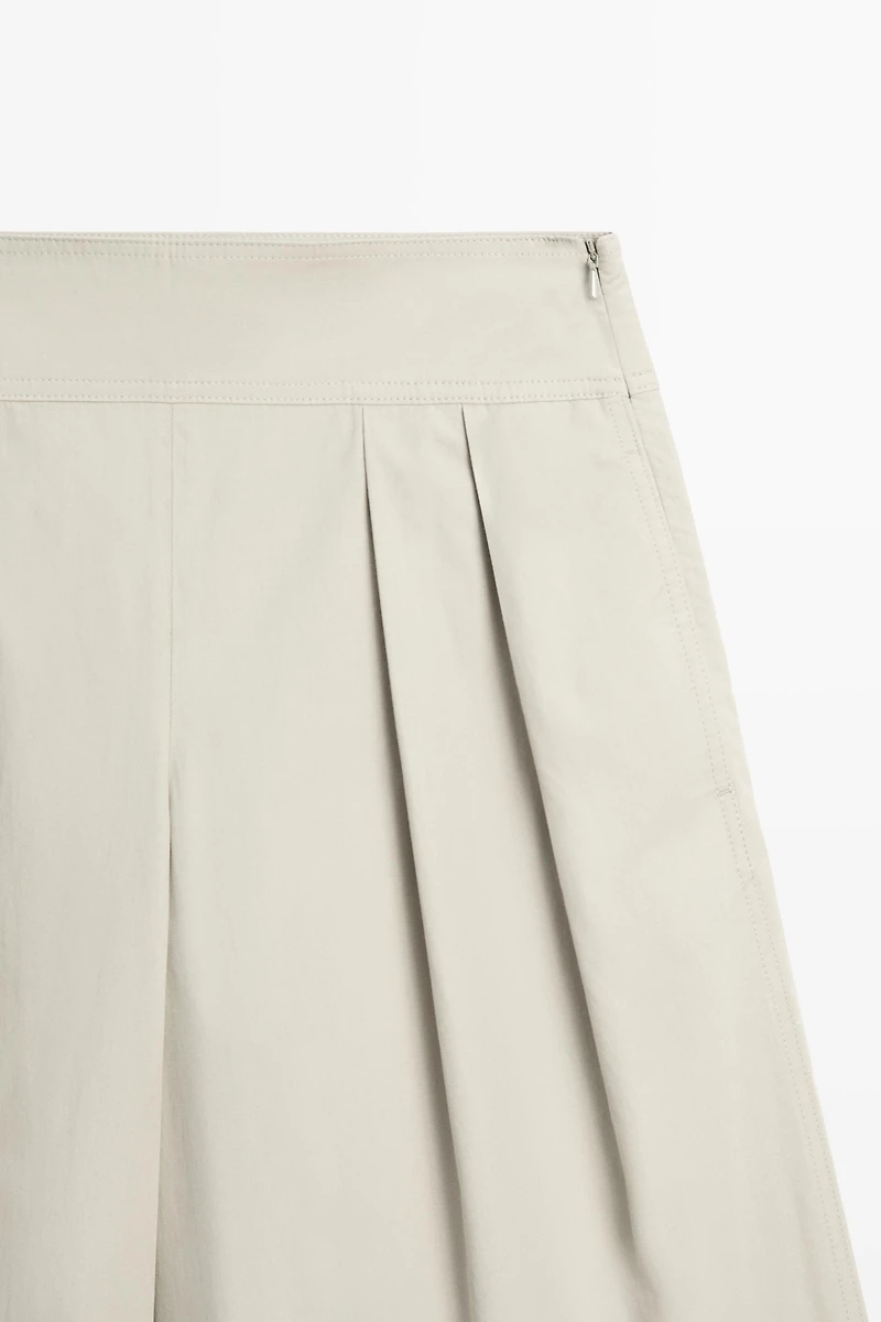 Wide-leg pants with pleated sash detail
