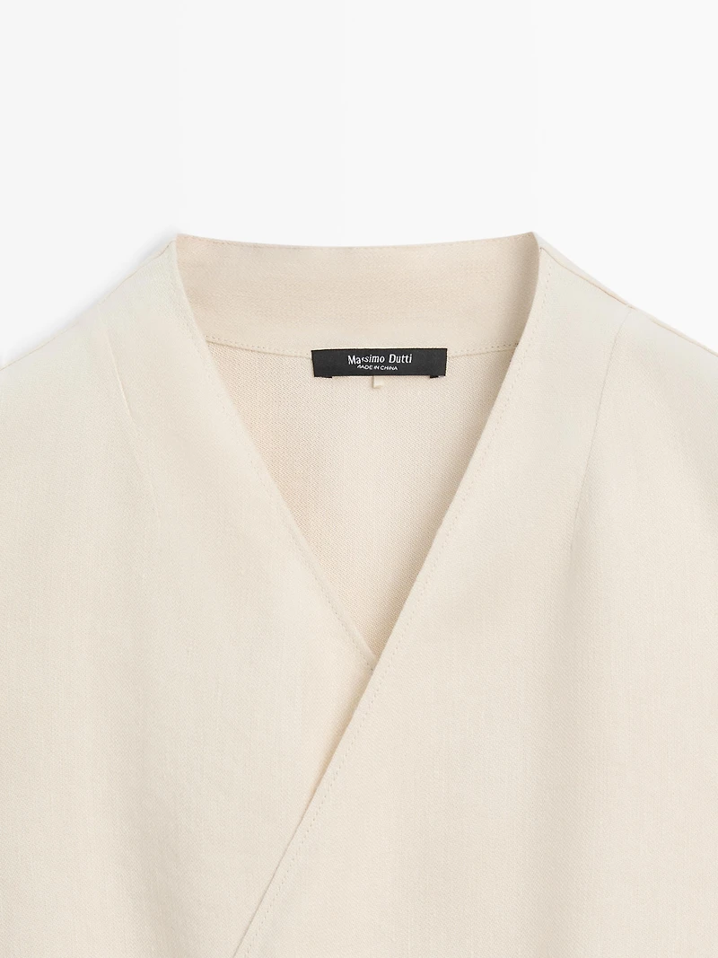 Flowing linen blend crossover top
