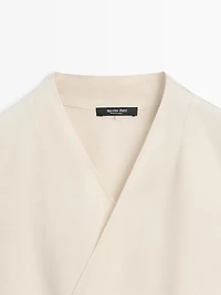Flowing linen blend crossover top