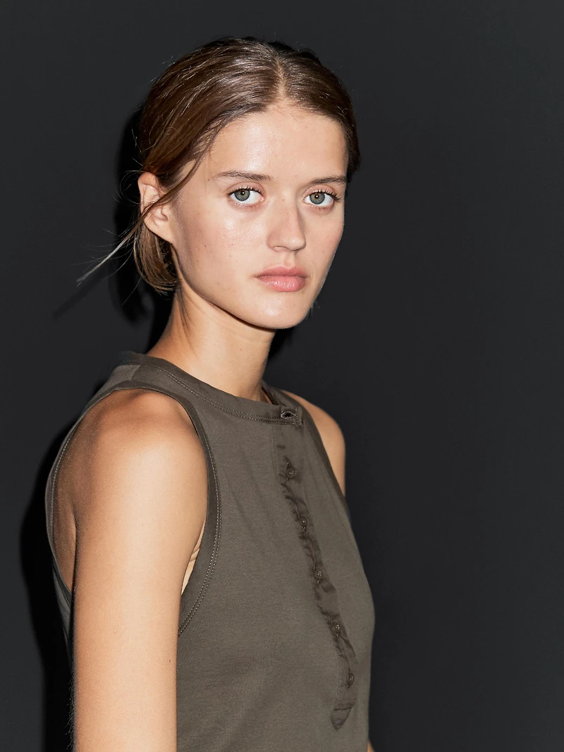 Top with contrast trim detail