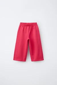 PANTALON WIDE LEG INTERLOCK INSCRIPTION EN RELIEF