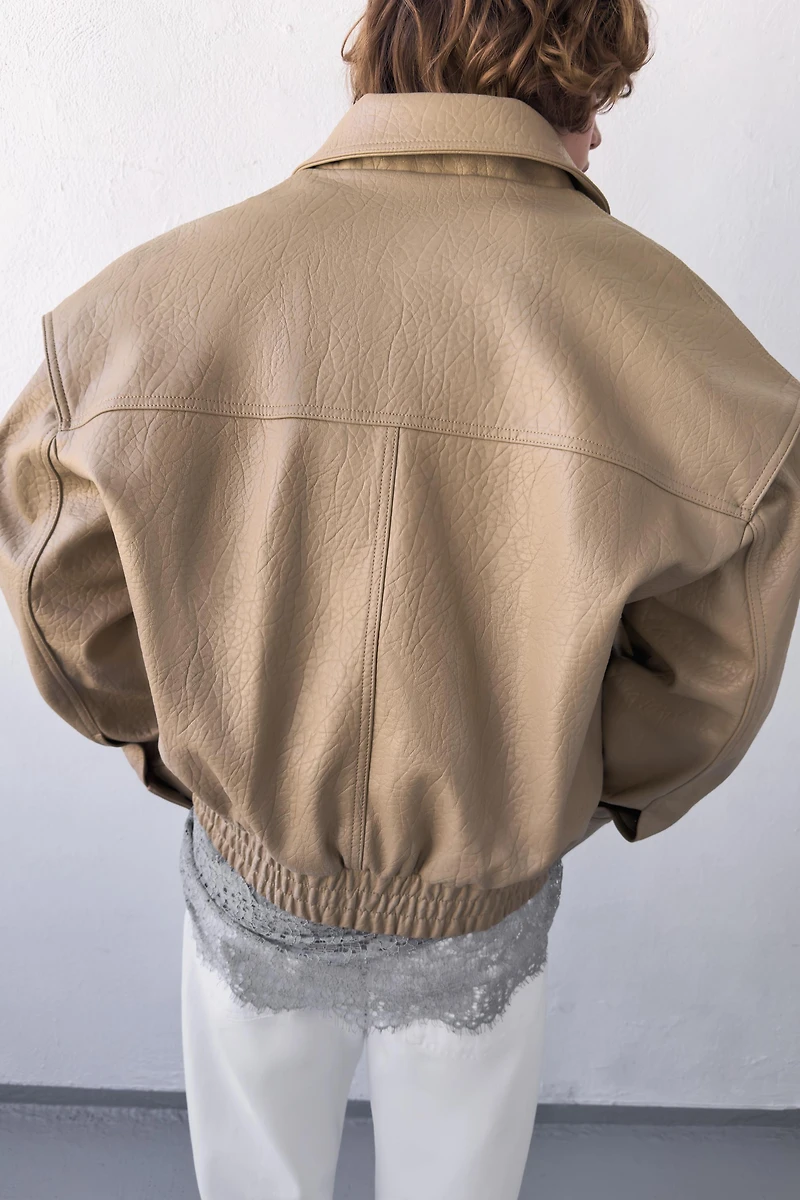 BOMBER EN MATIÈRE SYNTHÉTIQUE