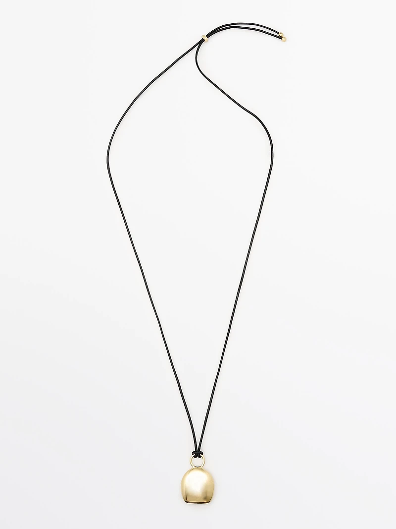 Pendentif pièce dorée