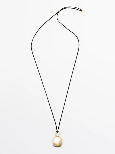 Pendentif pièce dorée