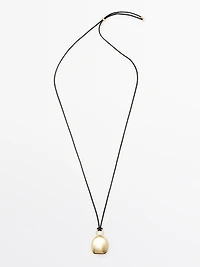 Pendentif pièce dorée