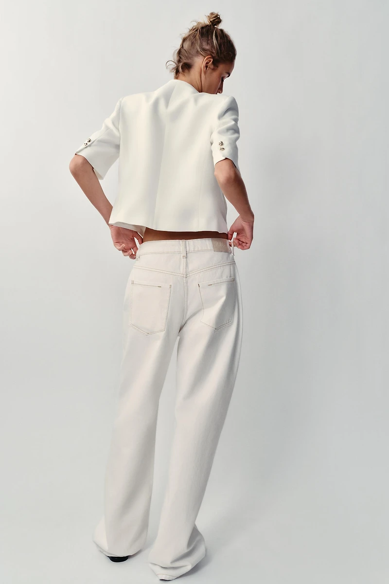 VESTE À MANCHES COURTES ET ÉPAULETTES