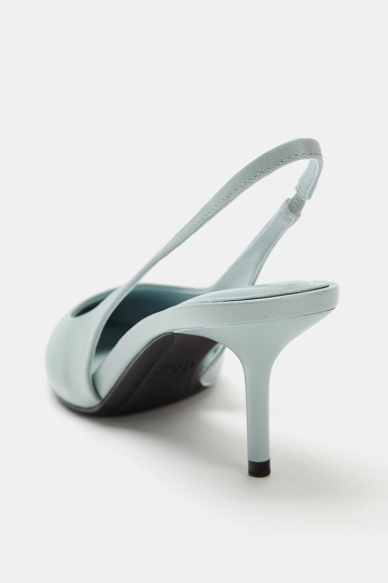 CHAUSSURES À TALONS OUVERTES L'ARRIÈRE