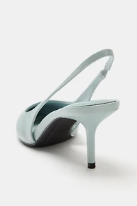 CHAUSSURES À TALONS OUVERTES L'ARRIÈRE