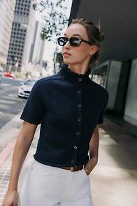 GILET EN MAILLE À MANCHES COURTES
