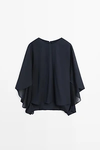 Asymmetric flowing cape