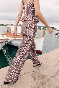 PANTALON LARGE À BRODERIES PERFORÉES