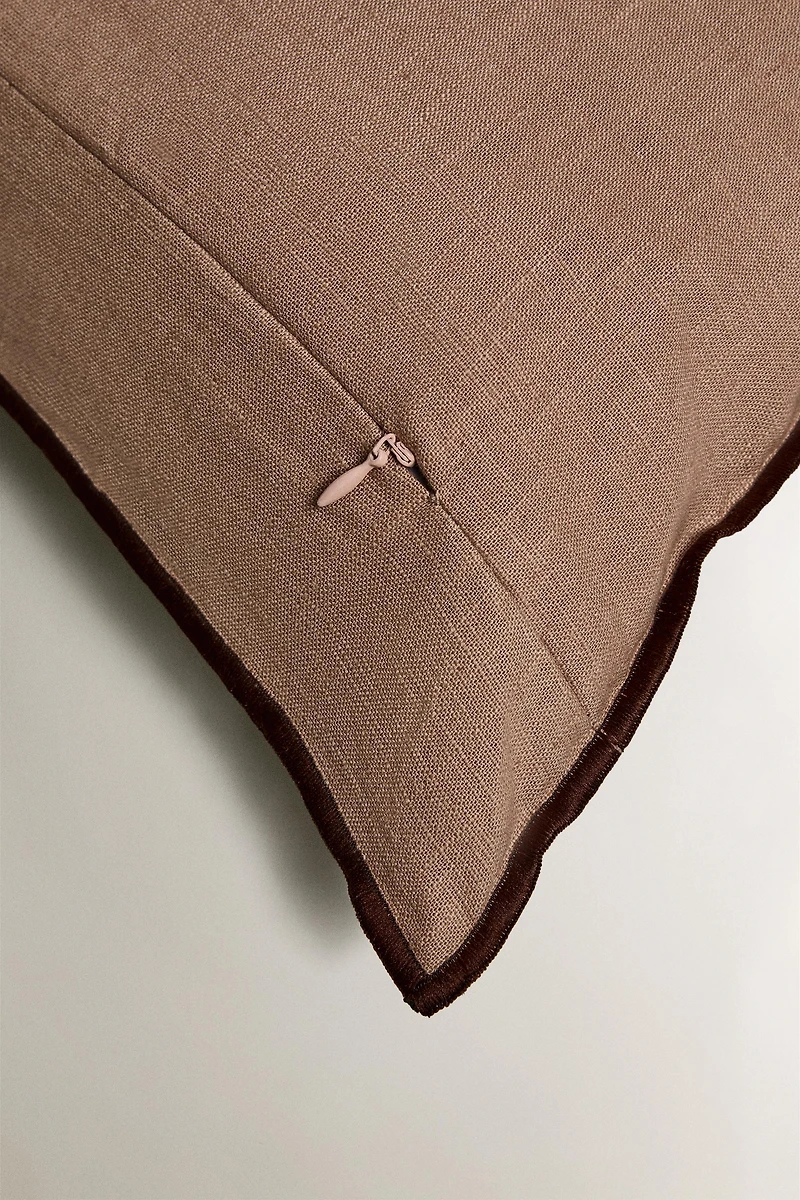 HOUSSE DE COUSSIN OVERLOCK