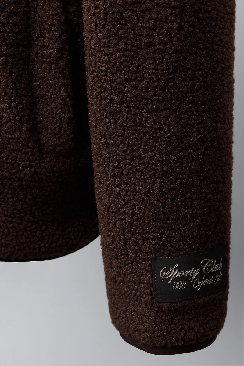 VESTE EFFET MOUTON LISERÉS